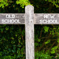 Wooden sign that reads old:new school