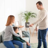 Man giving alimony to his ex-family at home