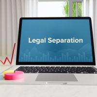 Legal Separation – Statistics/Business. Laptop in the office with term on the Screen. Finance/Economy.